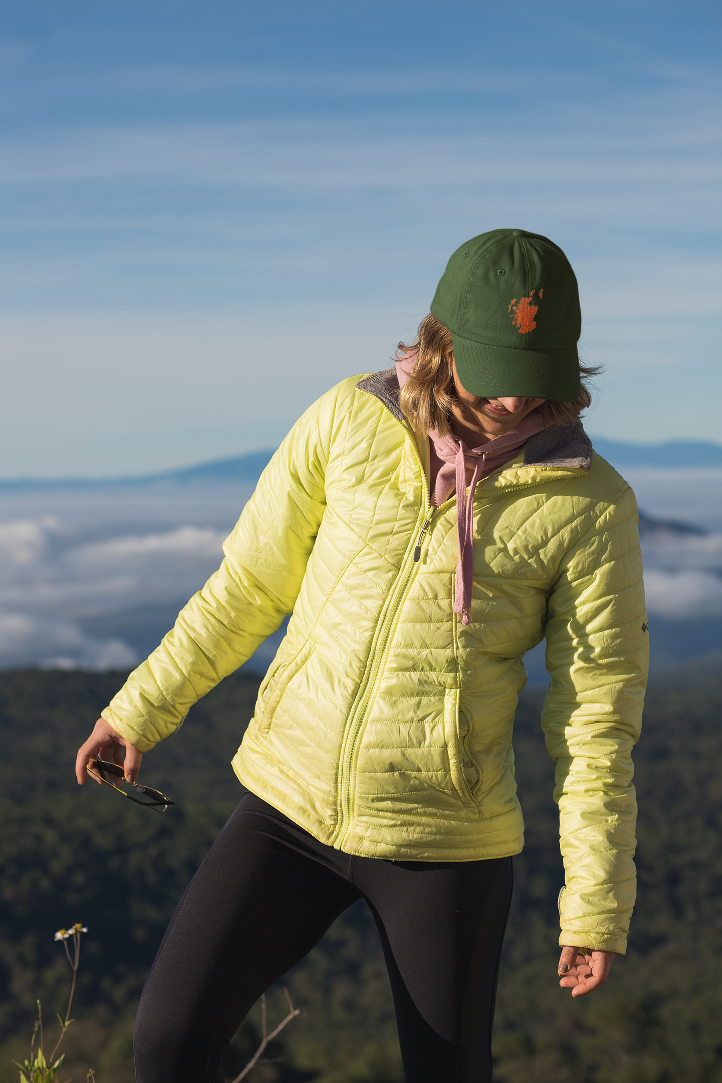 mockup-of-a-hiker-wearing-a-dad-hat-at-the-mountains-30472.png