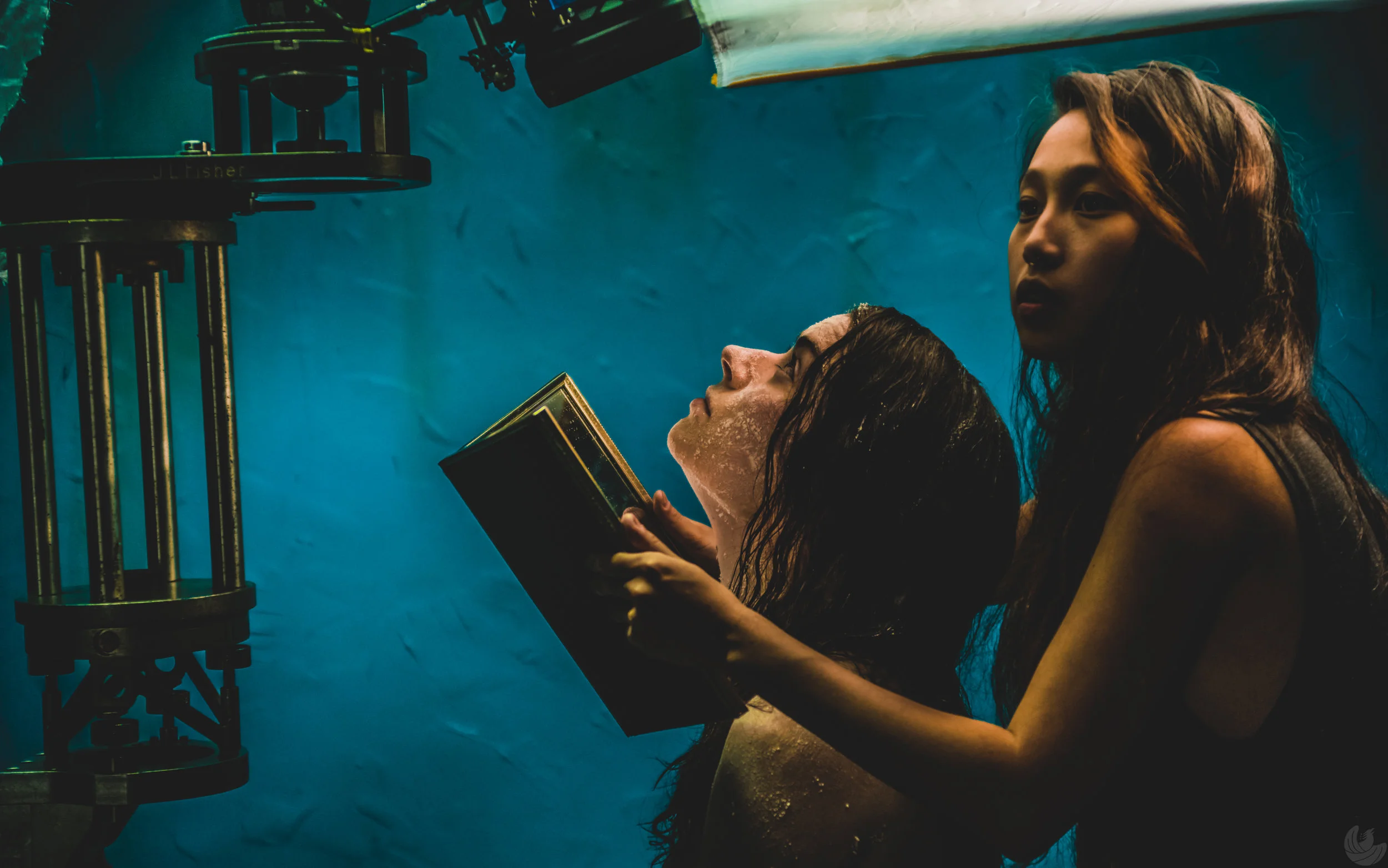 Maureen Renee Hughes, left, and director Joy Song frame up an overhead shot on the set of QUIETUS. (Oleg Bolotov/Auspicious Phoenix Productions)