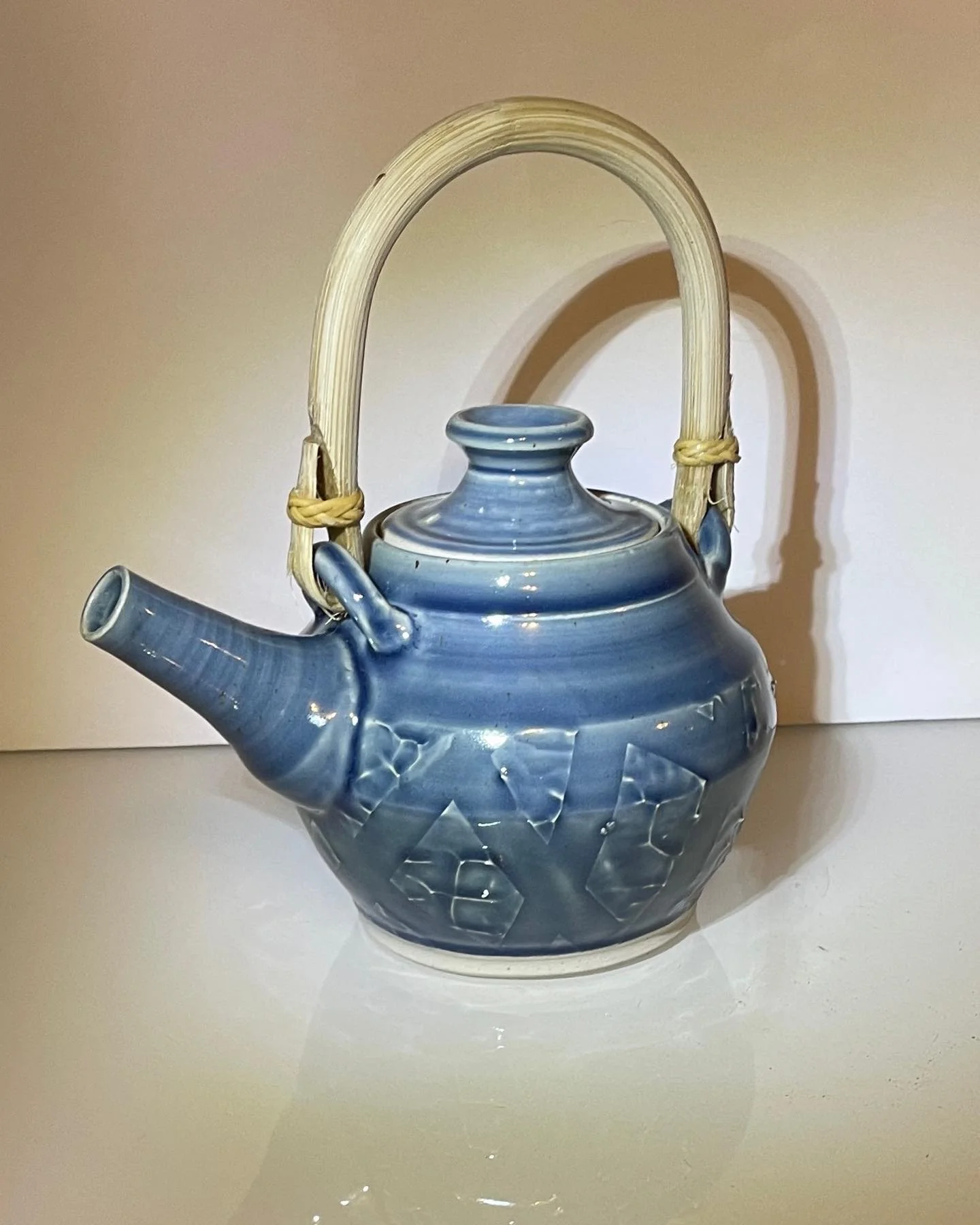 STONEWARE TEA POT WITH CANE HANDLE