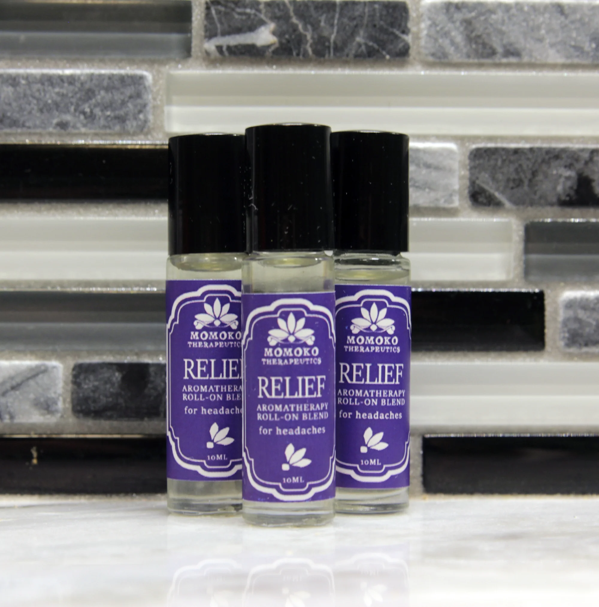 Relief Aromatherapy Roll-On Blend- all natural, vegan, organic perfume oil for migraines, headaches, and tension