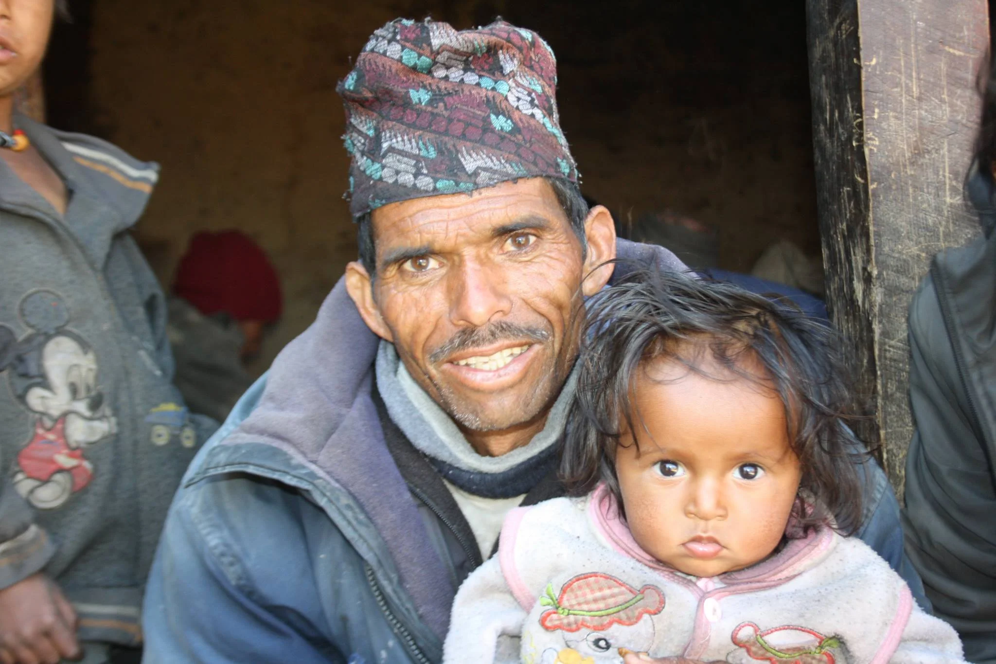Usha's father's last photo was taken with her daughter Ramita. This photo proudly hangs in their house.