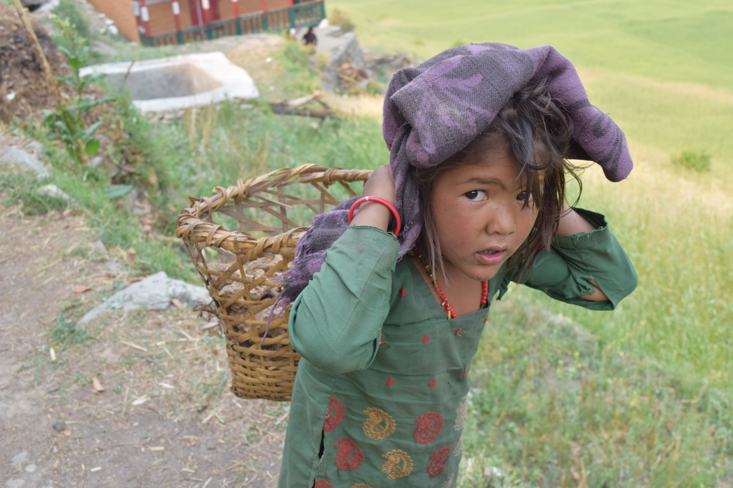 Even the youngest kids must work to support their families - carrying supplies over 16 hours.