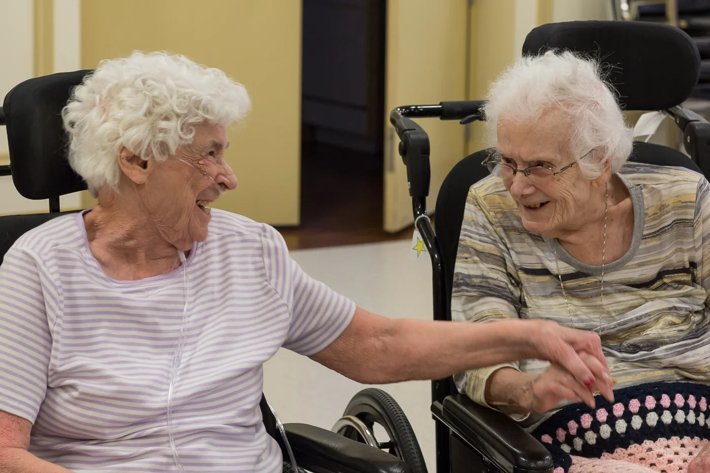 Enjoying a laugh with another resident