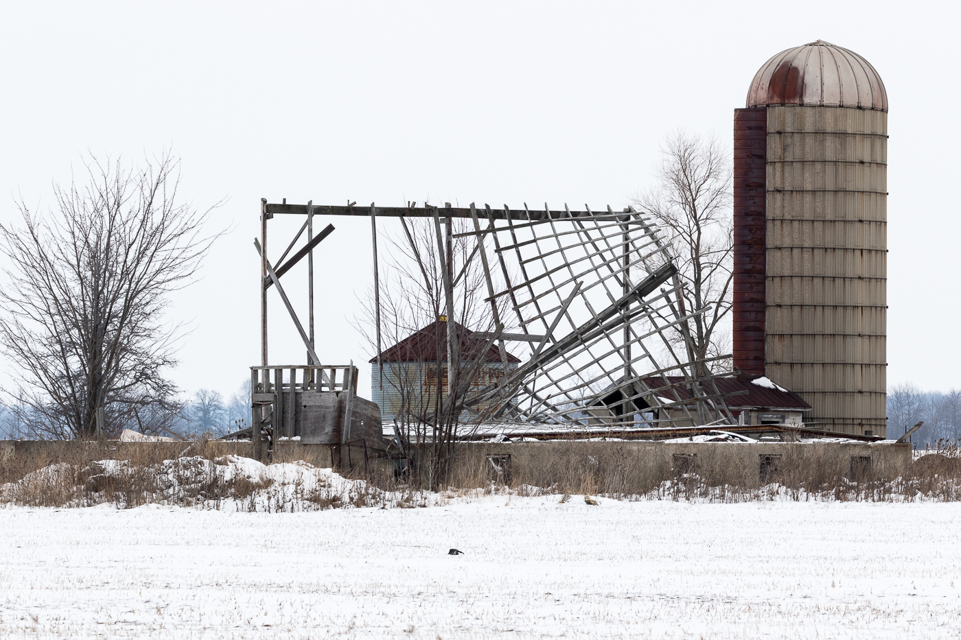 Silo with Damaged Buildings