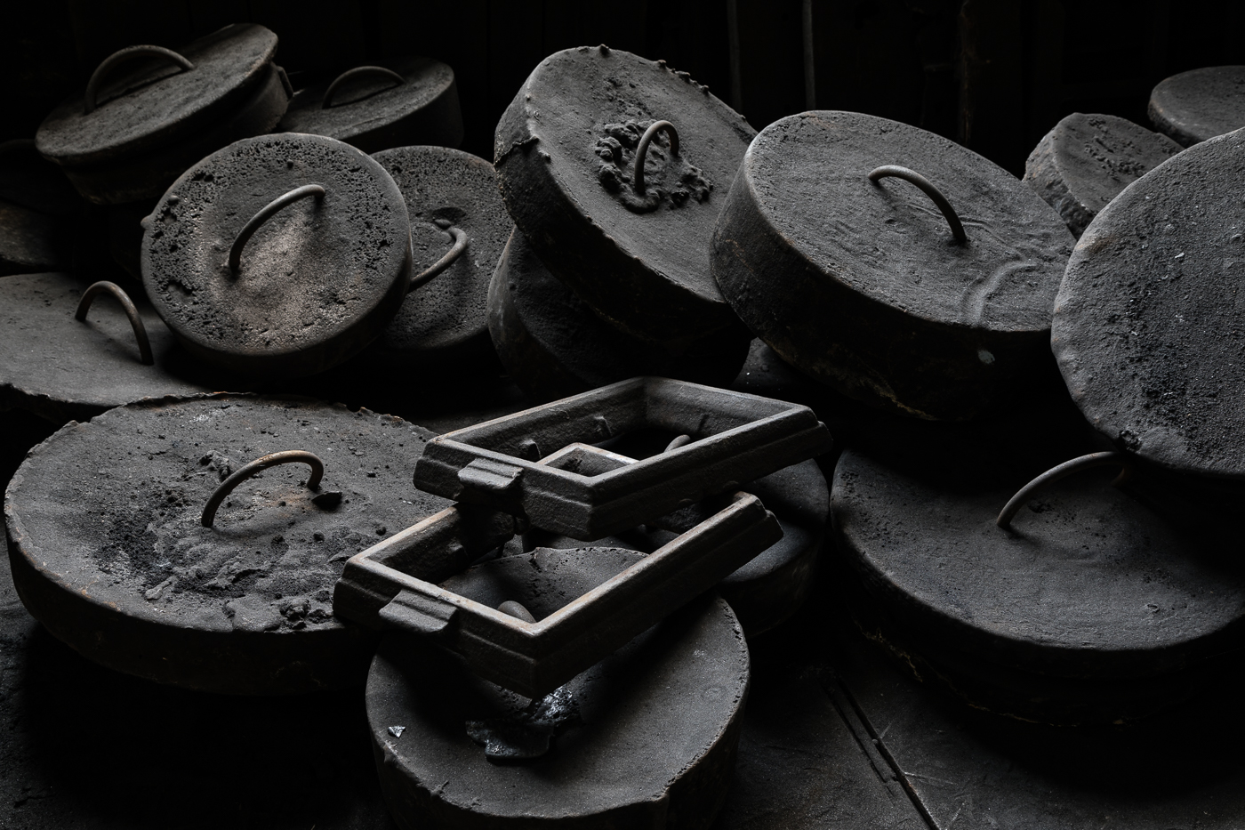 Discs on the Floor of a Foundry