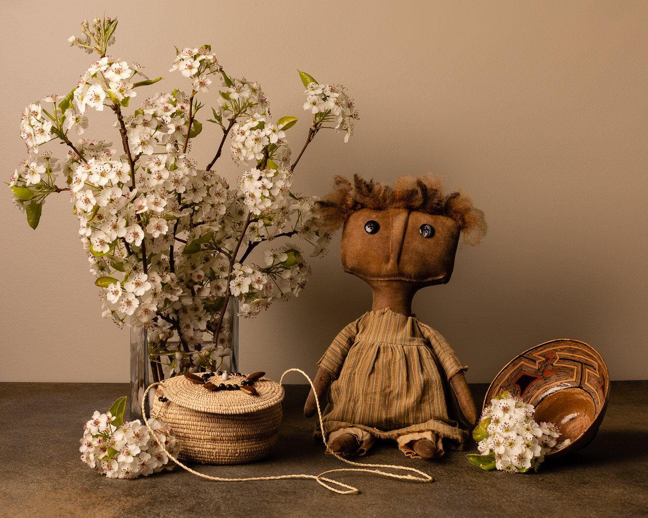 Still Life with Rustic Doll, Pear Blossoms and Handmade Items from the Ecuadorean Amazon
