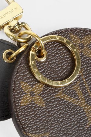 Louis Vuitton, A 'Monogram Reverse' Key Holder and Bag Charm. - Bukowskis