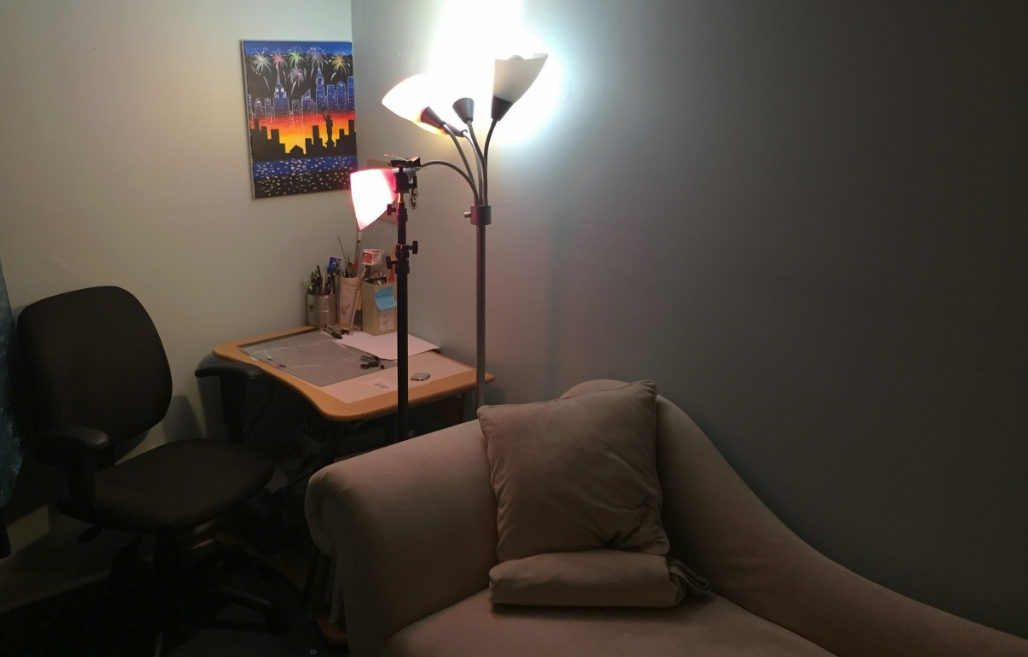 Aside the chair is my makeshift closet, to my left is the book shelf and behind me is my armoire (all not visible in the photo).