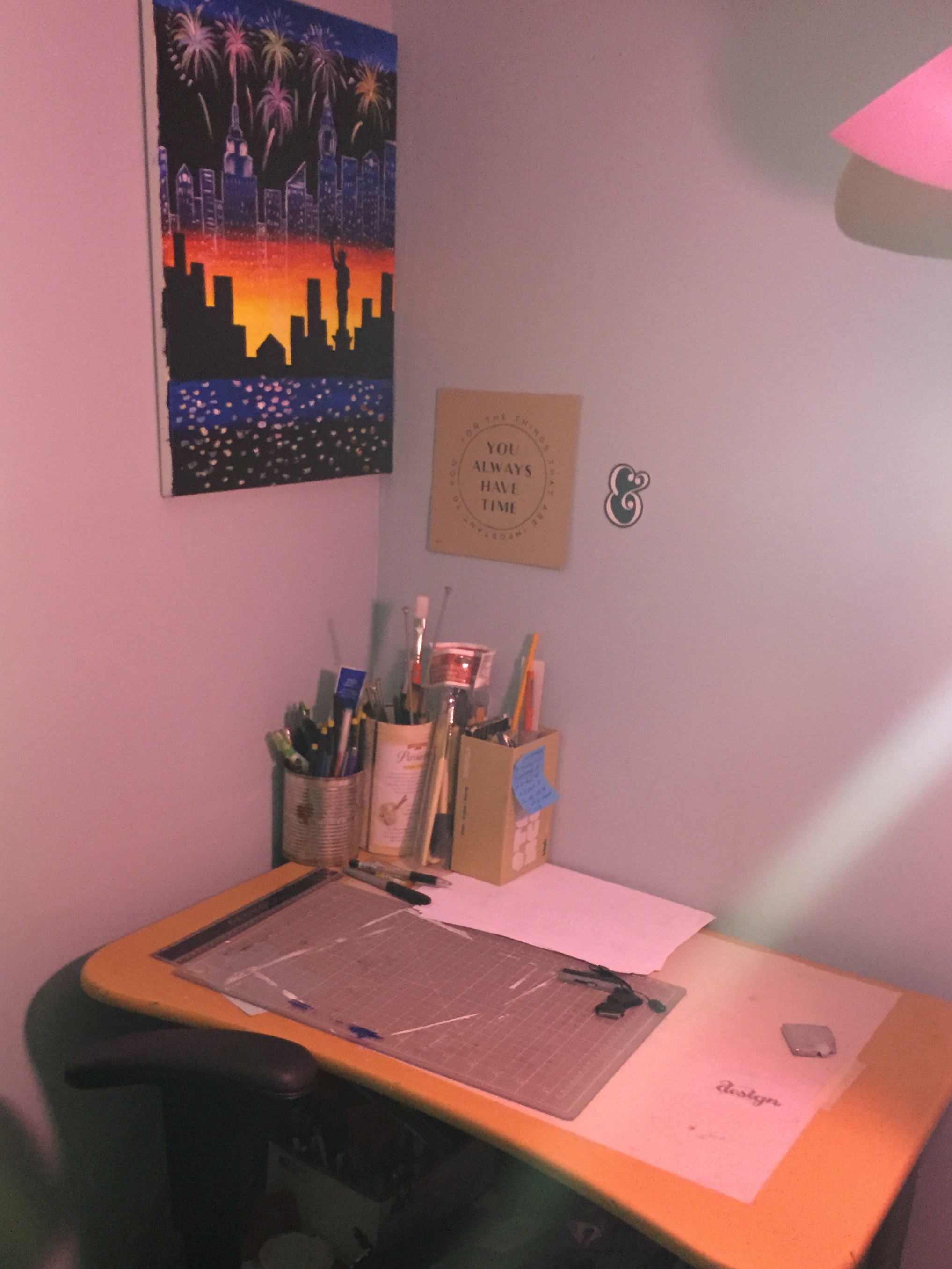 A close up of where I go to practice. Do you notice a theme? On the desk I have a cutting mat and my paint Brushes. I need to add more wall art!
