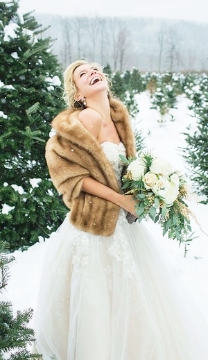 Laughing in the Snow in Light Brown Faux Fur Stole.jpg