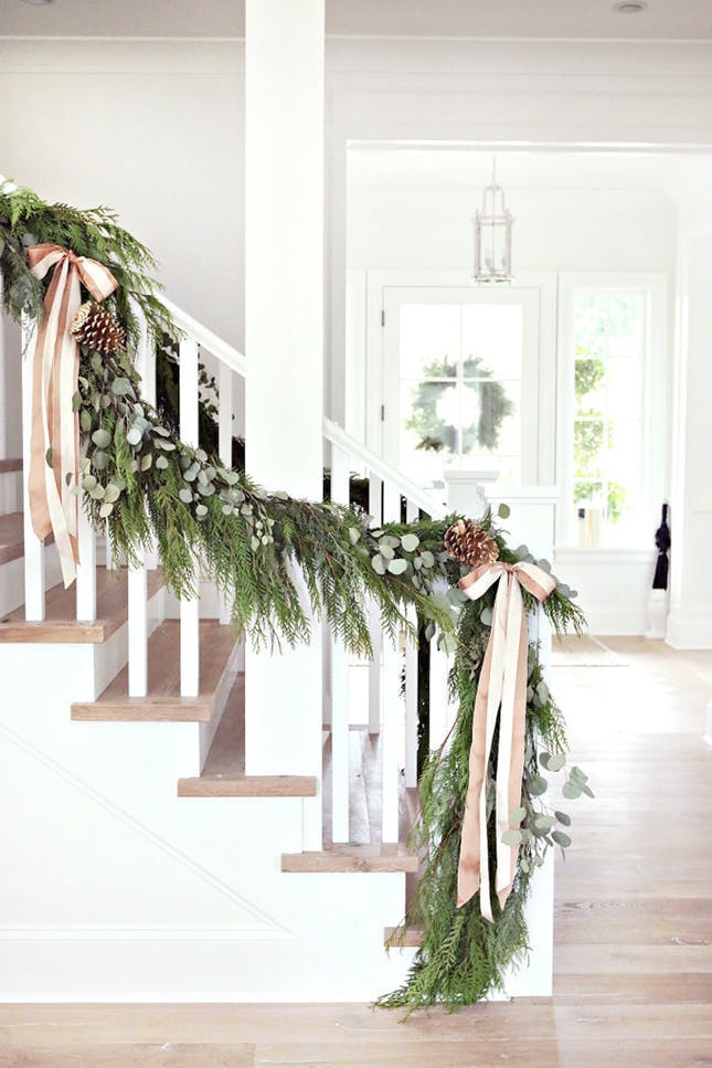 Staircase-Banister-pink-and-green-garland.jpg