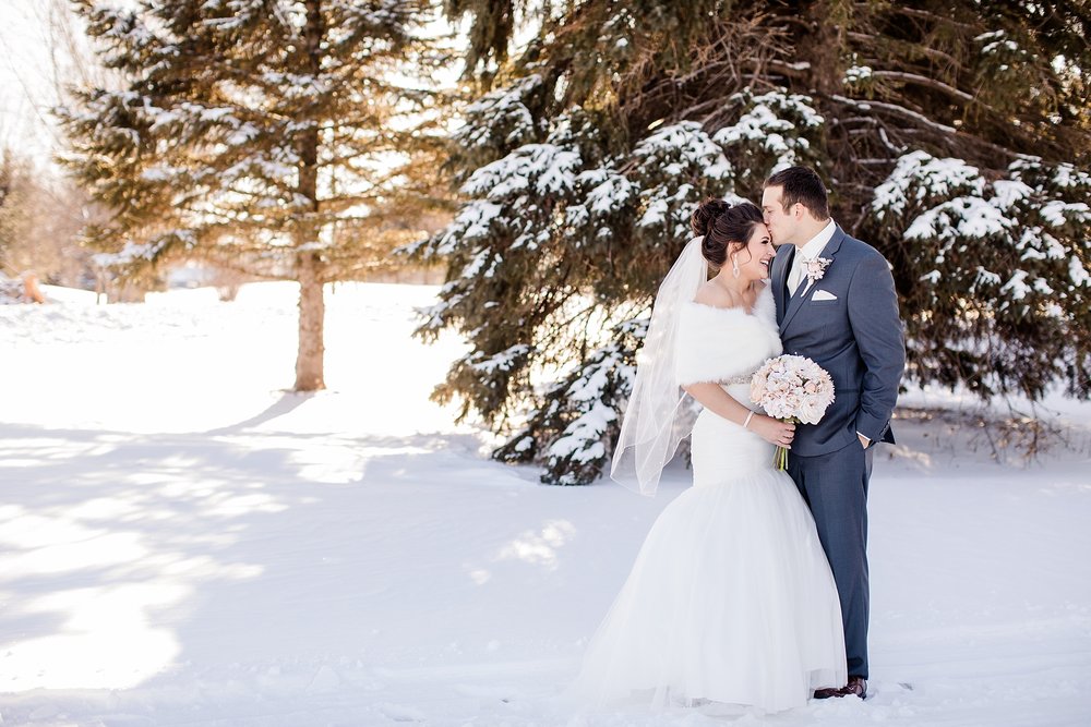 Outdoor Wedding Forehead Kiss.jpg