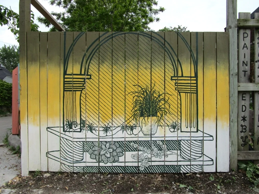 Purify Your Air mural on fence around community garden on Milky Way ave, Toronto 2015