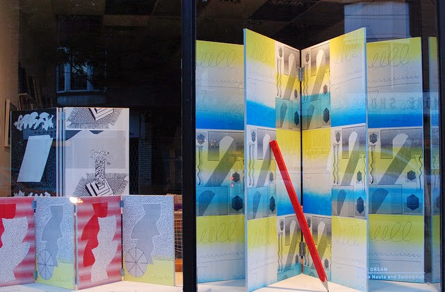 Zine Dream window Three screenprinted wooden book sculptures and giant wood pencil Eunice Luk and Alicia Nauta Art Metropole August 2014
