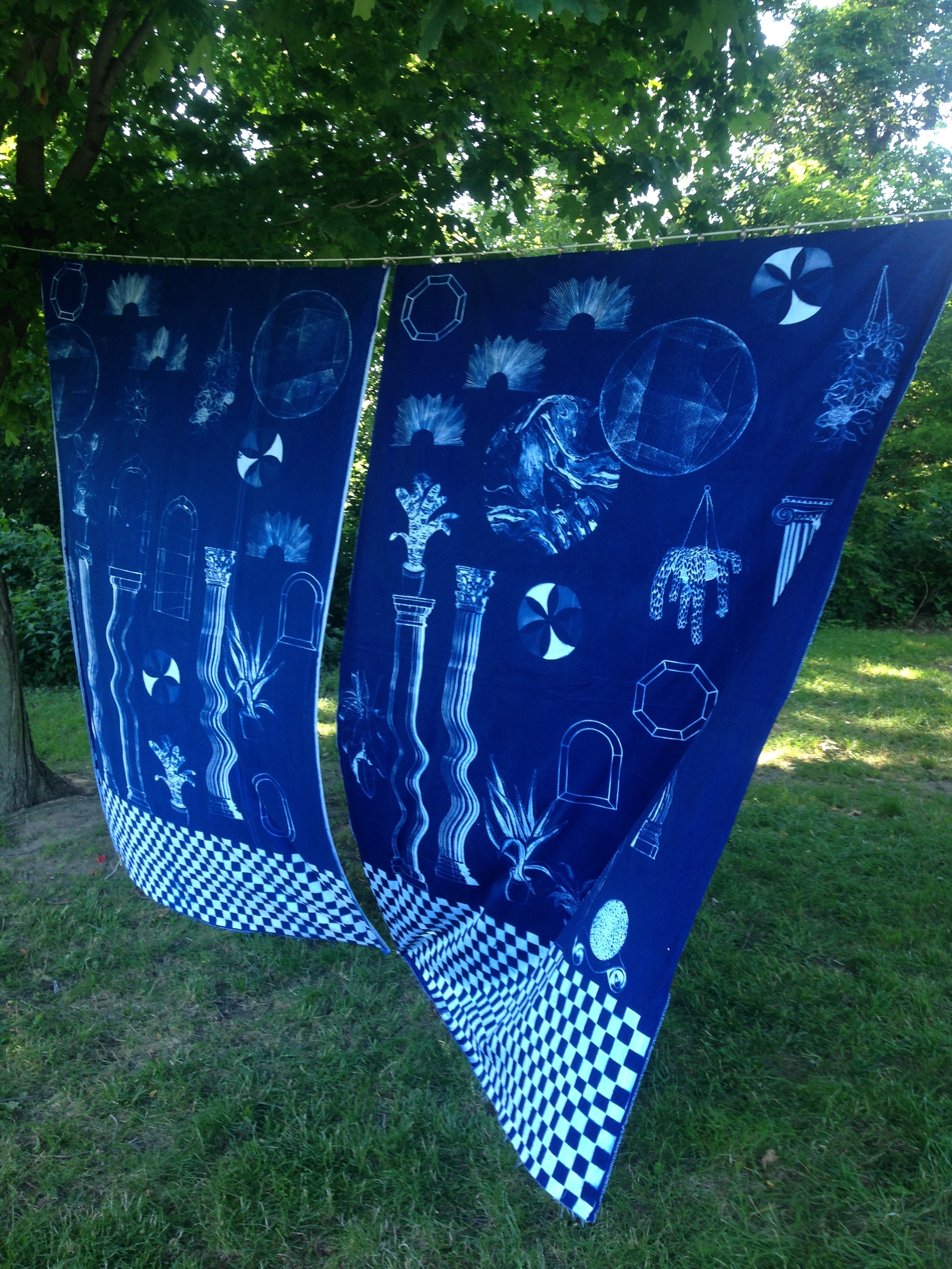  a place halfway between both worlds where anyting can happen and there is no problem with time  Cyanotype sun printed curtains, each 5' x 7'  Feast in the East, Praire Drive park, Scarborough&nbsp;  2017 