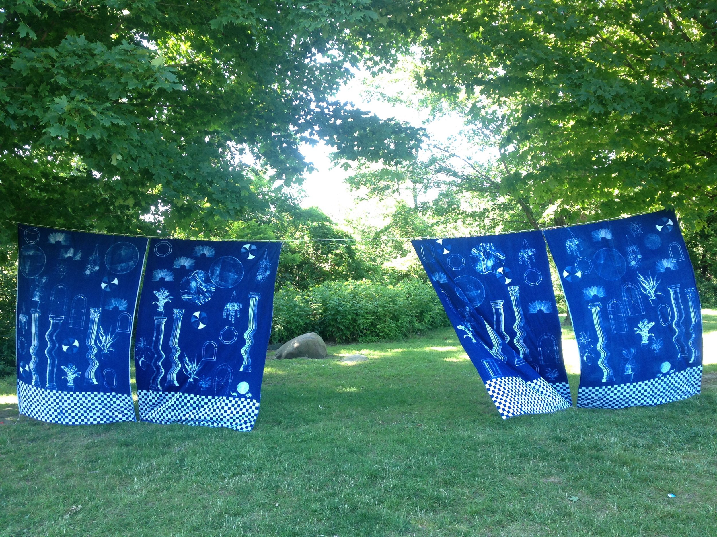  a place halfway between both worlds where anything can happen and there is no problem with time  Cyanotype sun printed curtains, each 5' x 7'  Feast in the East, Praire Drive park, Scarborough&nbsp;  2017 