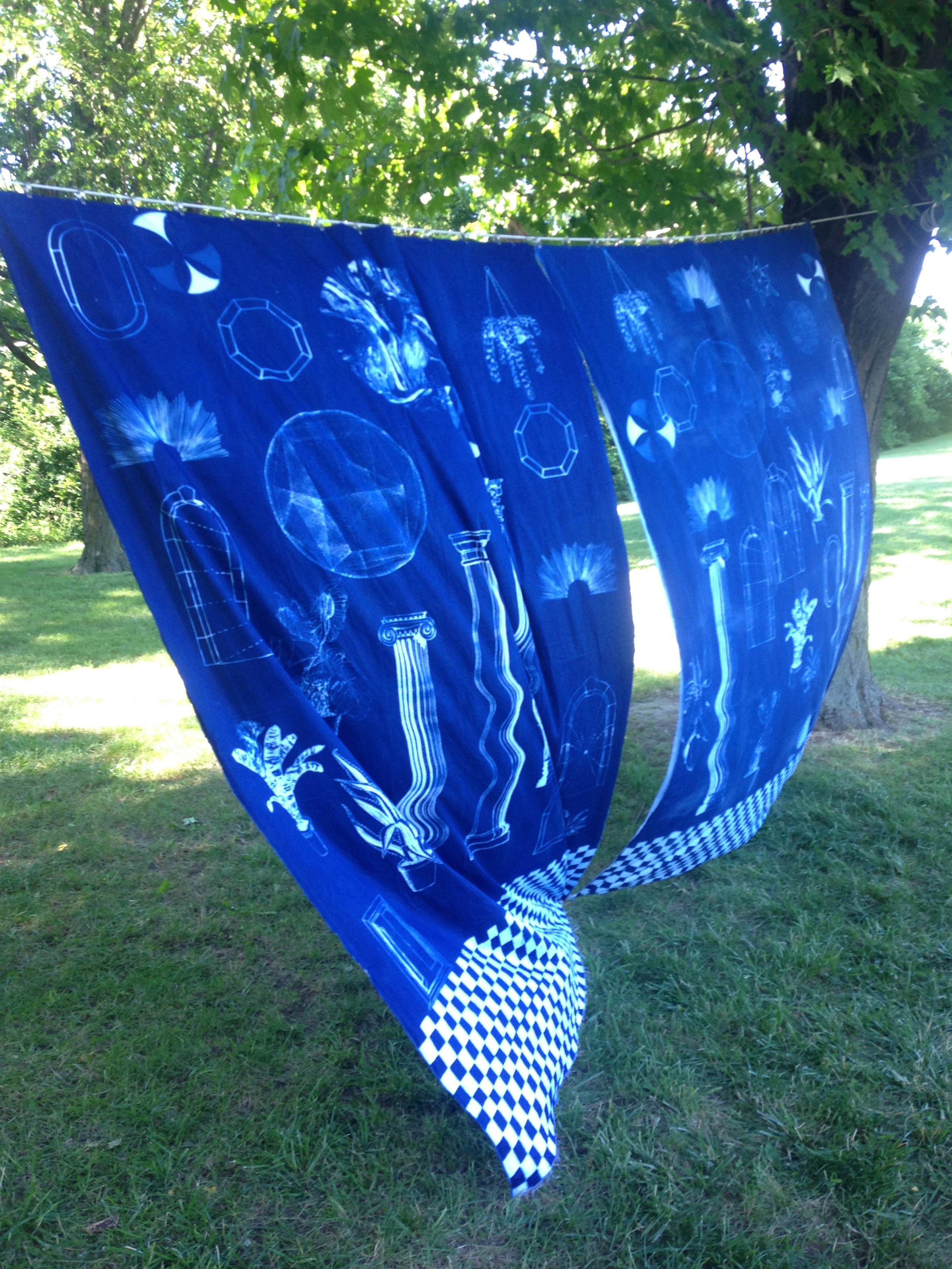  a place halfway between both worlds where anything can happen and there is no problem with time  Cyanotype sun printed curtains, each 5' x 7'  Feast in the East, Praire Drive park, Scarborough&nbsp;  2017 