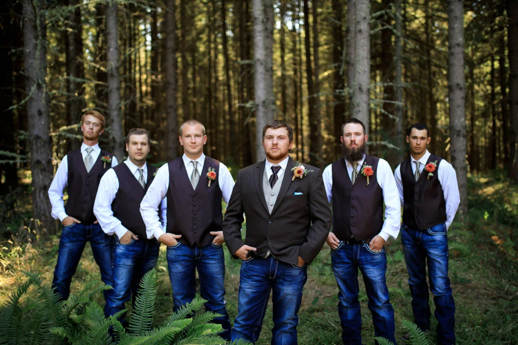 Groom with his groomsmen in the forest.