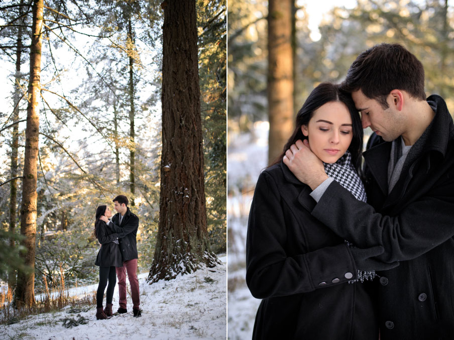 Man and woman embracing each other in the snowy forest.