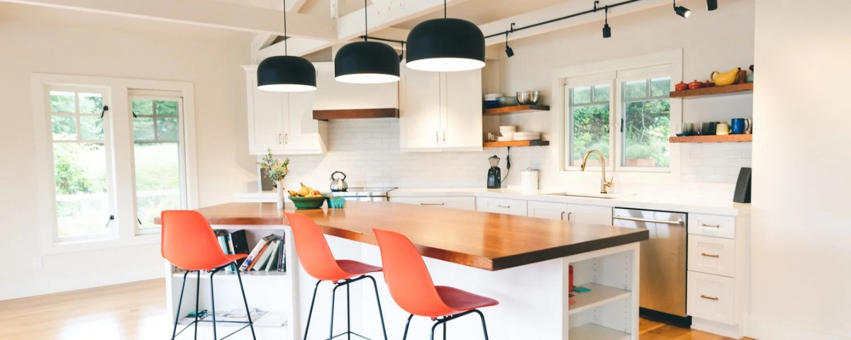 modern kitchen with orange chairs near the kitchen island in bremerton, washington