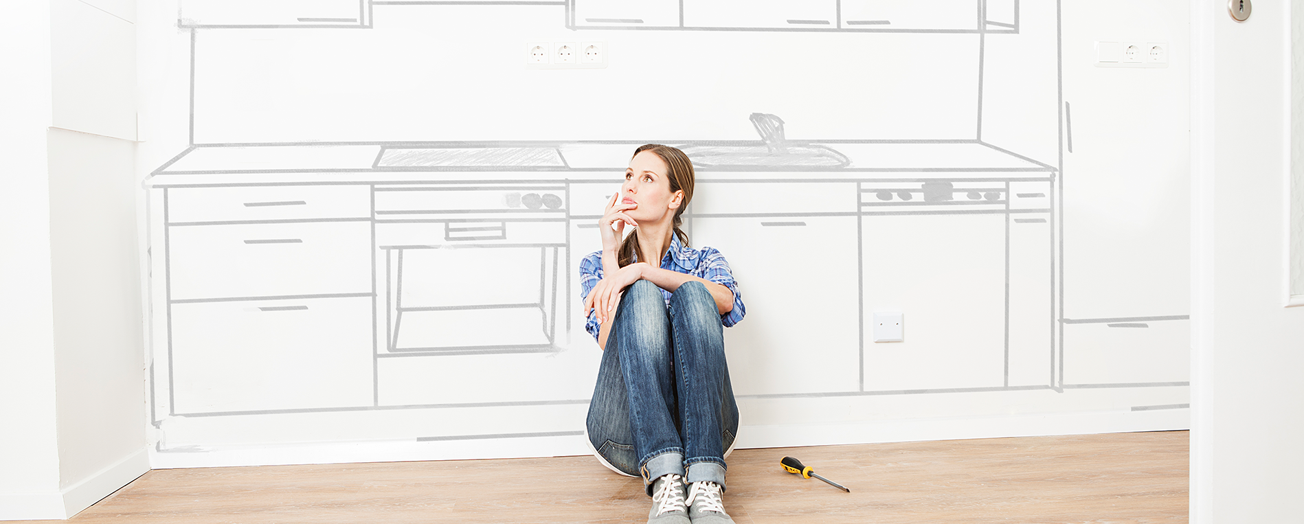 woman spacially thinking about kitchen remodel in kitsap county