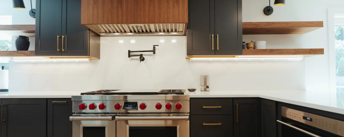 black matte cabinets in a modern kitchen with a steel oven in bremerton, washington