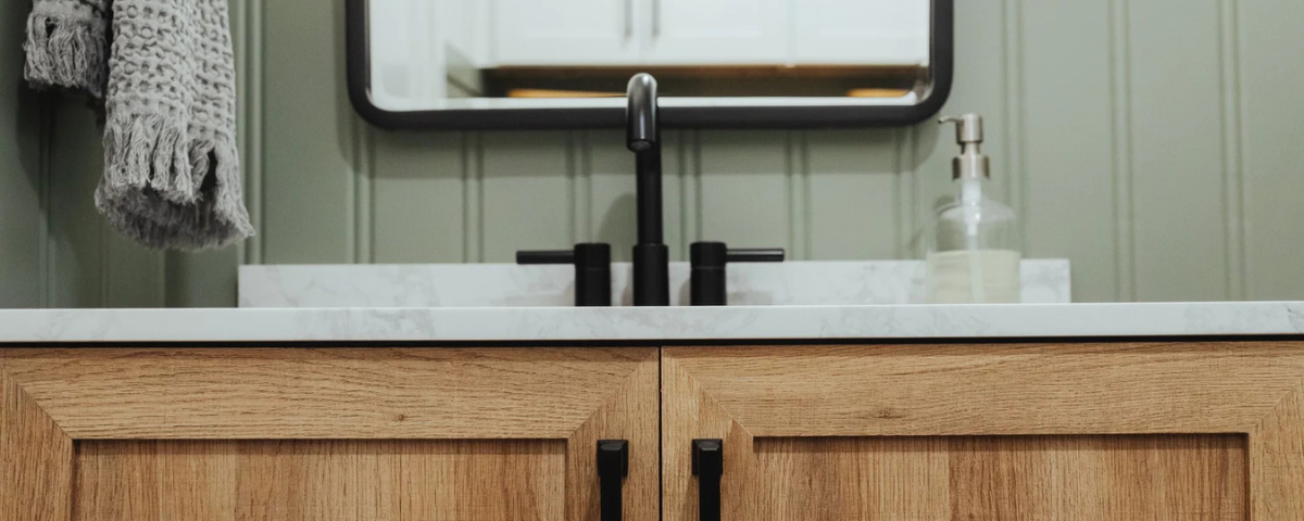 black matte sink faucet with a Pacific Northwest wood cabinets in bremerton, washington