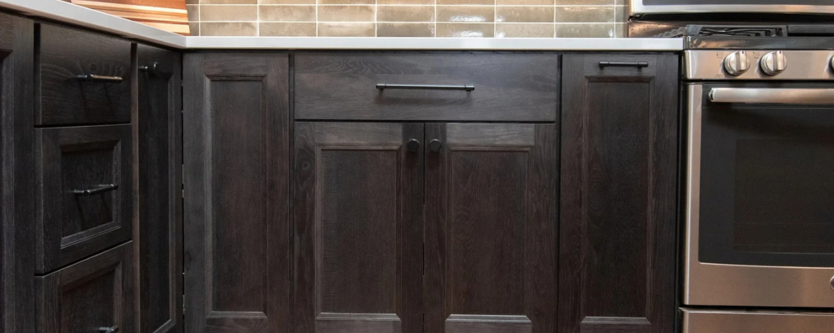 dark cabinetry near the steel stove in bremerton, washington