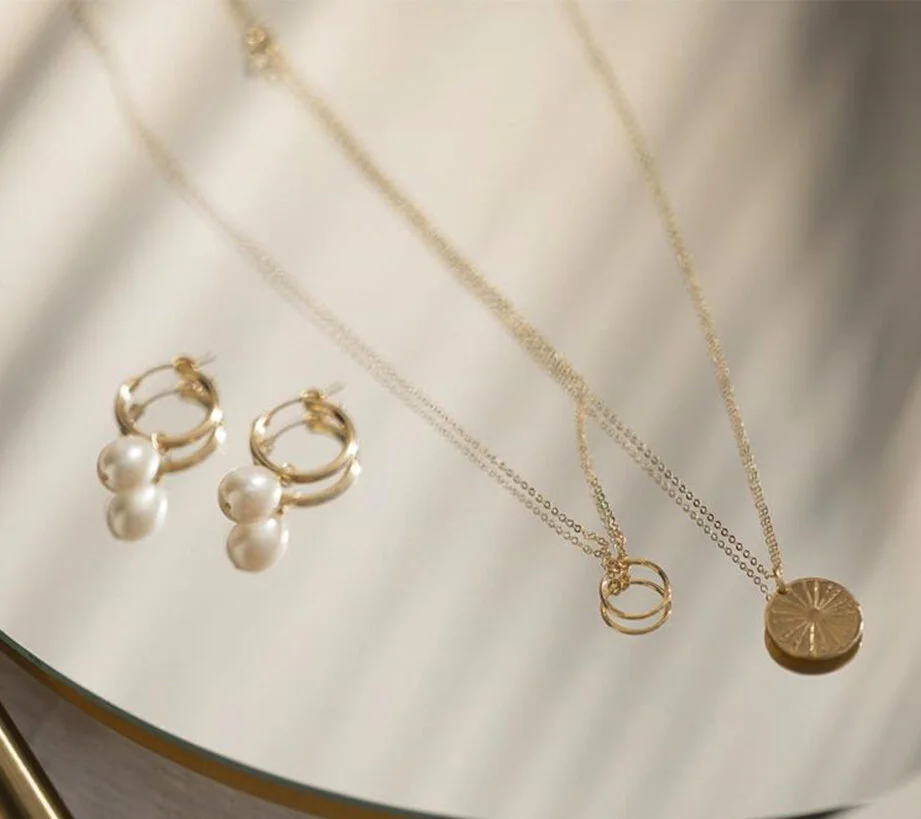 Anything gold and dainty, please.