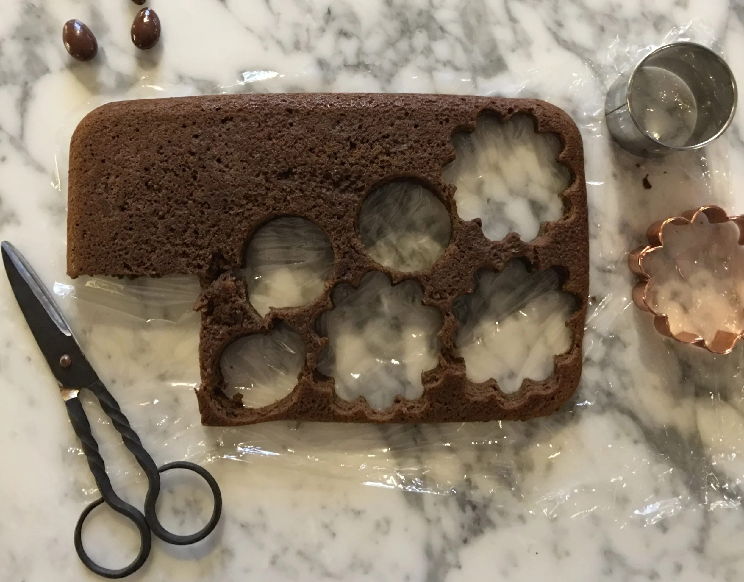 Use cookie cutters to cut out the cake layers 