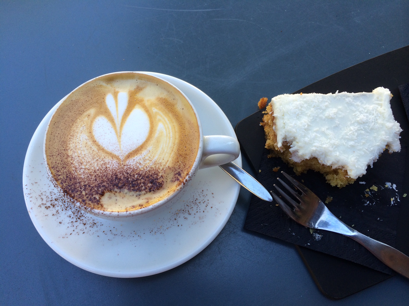 Coffee and cake at an outdoor cafe 
