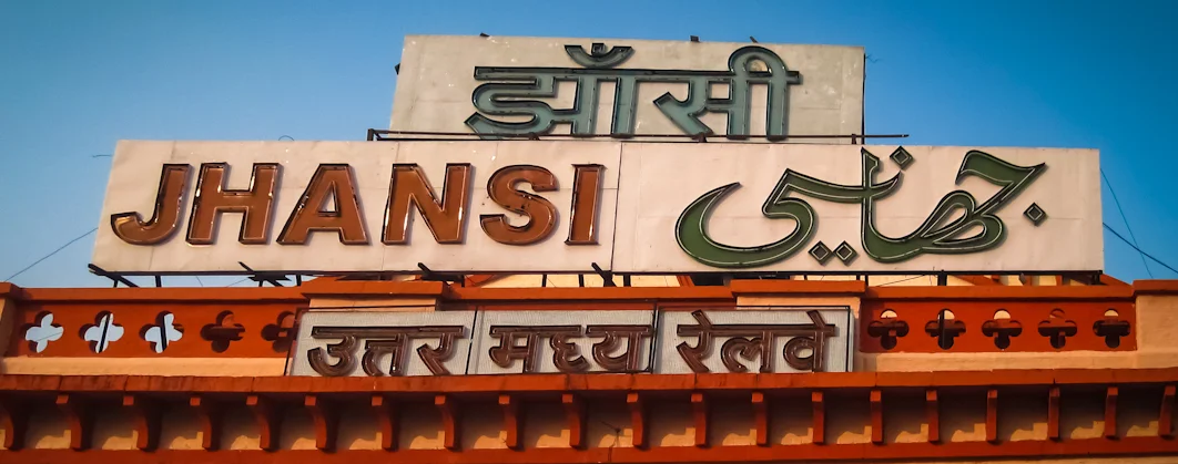 Train stationsigns are often printed in many languagesto accommodate the many ethnic groups in India