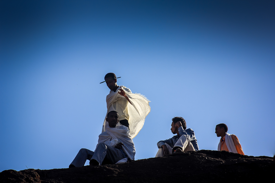 Followers of the Ethiopian Orthodox tradition overlook a ceremony at St. George Church in Lalibela the week before Easter