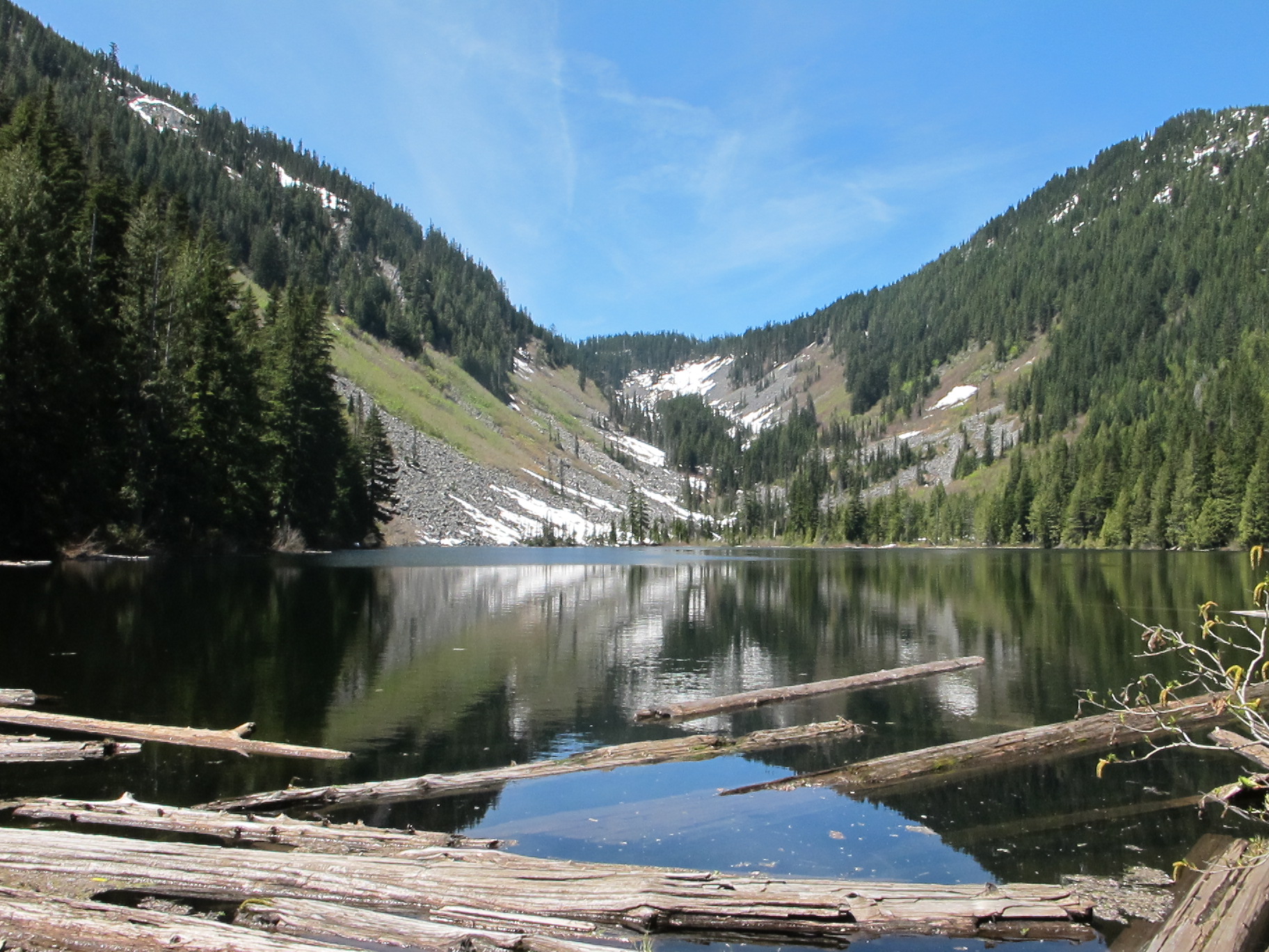 Talapus & Olallie Lakes Round Trip – 6.2 miles Elevation Gain – 1,220 feet Difficulty – Moderate Directions: From Seattle, head east on I-90 to exit 45. Turn left, and drive under the freeway on FR 9030. In 1 mile follow the road around to the right at a junction. Continue straight on a gravel, sometimes severely potholed road to the trailhead at the road's end. Northwest Forest Pass and Alpine Lakes Wilderness Permit required, both available at the trailhead.