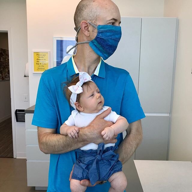 What a weird time to be alive-Am I right?!?⁣
⁣
We don&rsquo;t see a lot of people right now, and when Clara does go out (pictured here at her 2 month check-up) Mommy &amp; Daddy wear weird things on their faces. 😷 ⁣
⁣
Will your kids remember these t