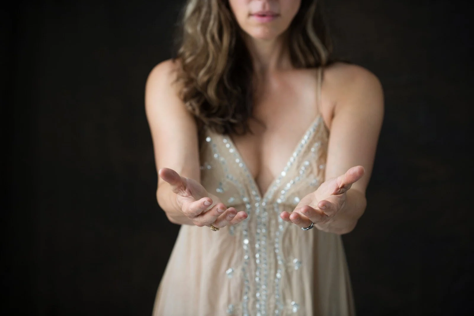 Lara Offering hands.jpeg