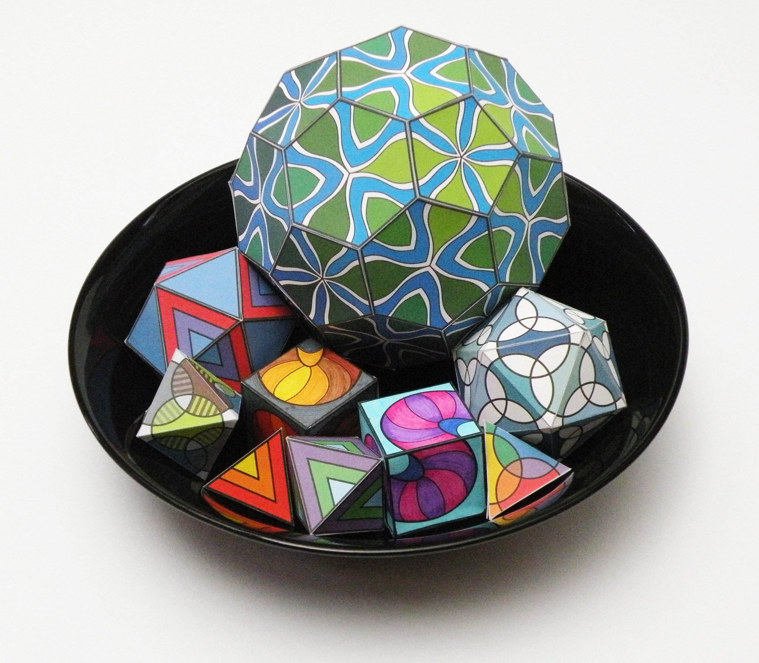 Polyhedra walk together into a snazzy display.