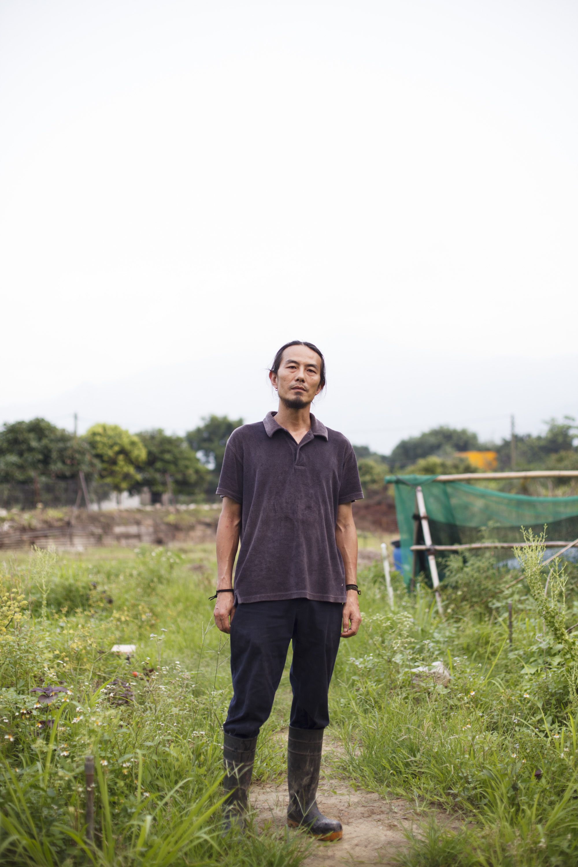 Steve Cheung, Owner of O-Veg standing in his farm in the Kam Tin in the New Territories, Hong Kong.