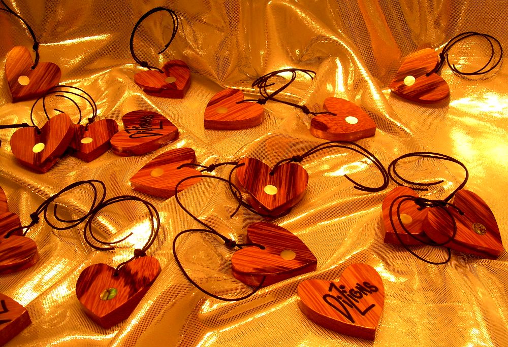 Exotic hardwood hearts with pearl inlay