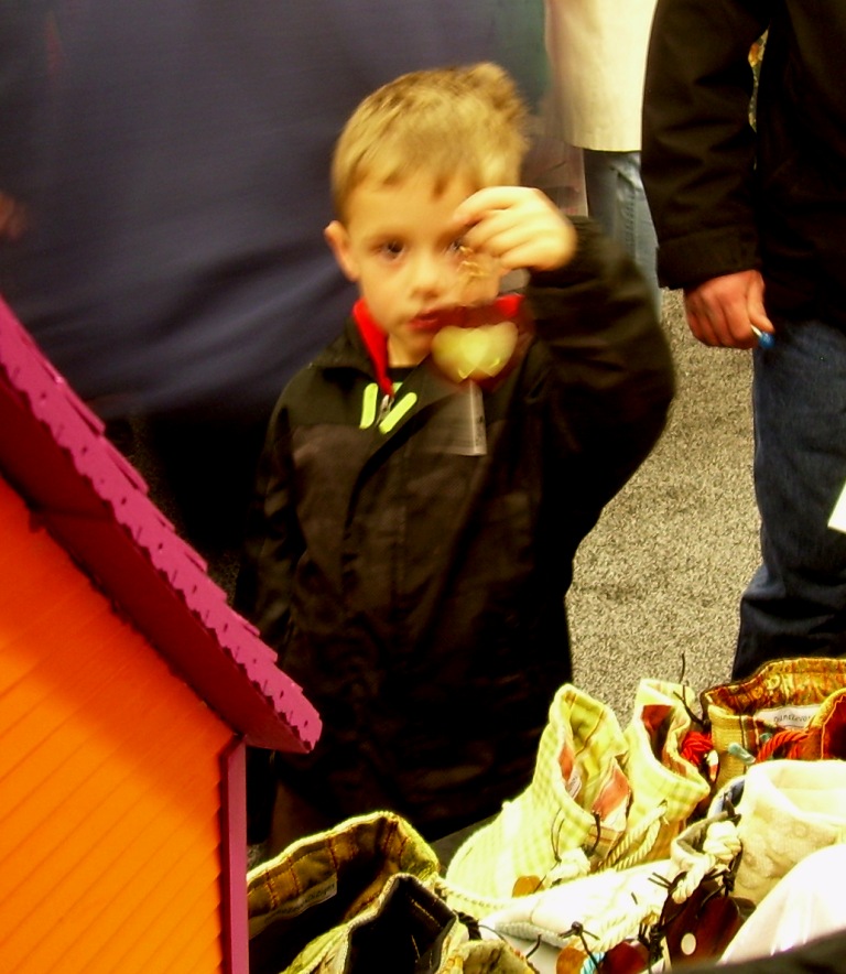 This little guy, Buddy, holding a heart that he'll be giving to his mom.