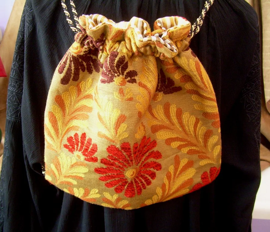 brown/rust/tan/yellow lined backpack