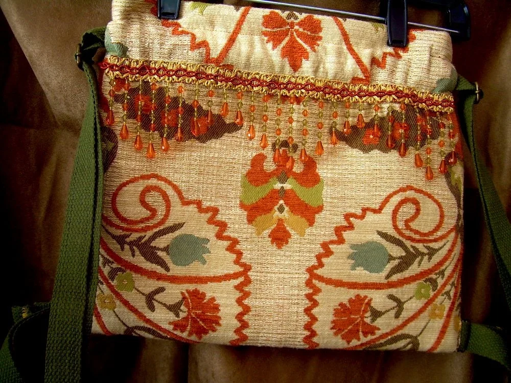 dutch drawstring backpack with beads and straps