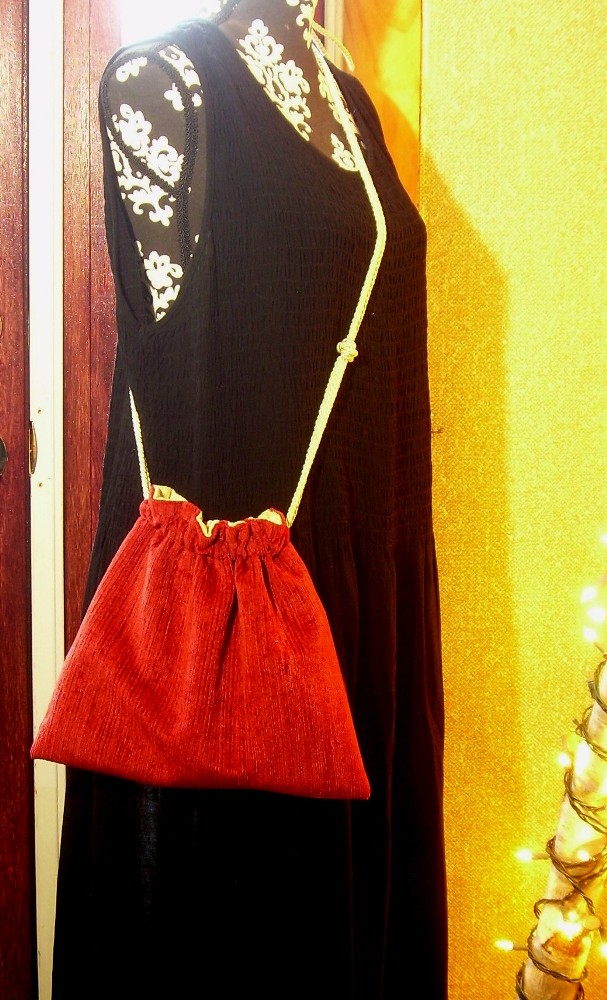 red corduroy bag with yellow satin brocade lining