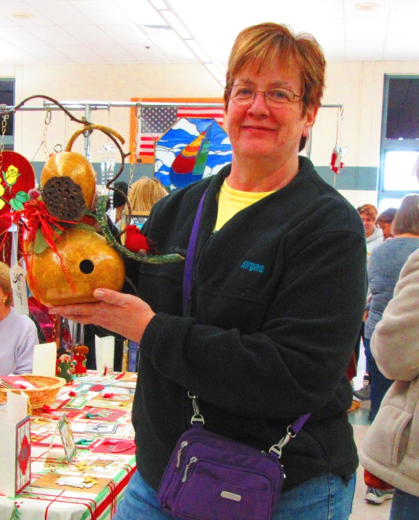 I was so happy that Kathleen bought a gourd arrangement from me. As cute as they are and people say to me, the sales have been down from when I first made some. She's going to set it outside her window so she can look out and admire it.