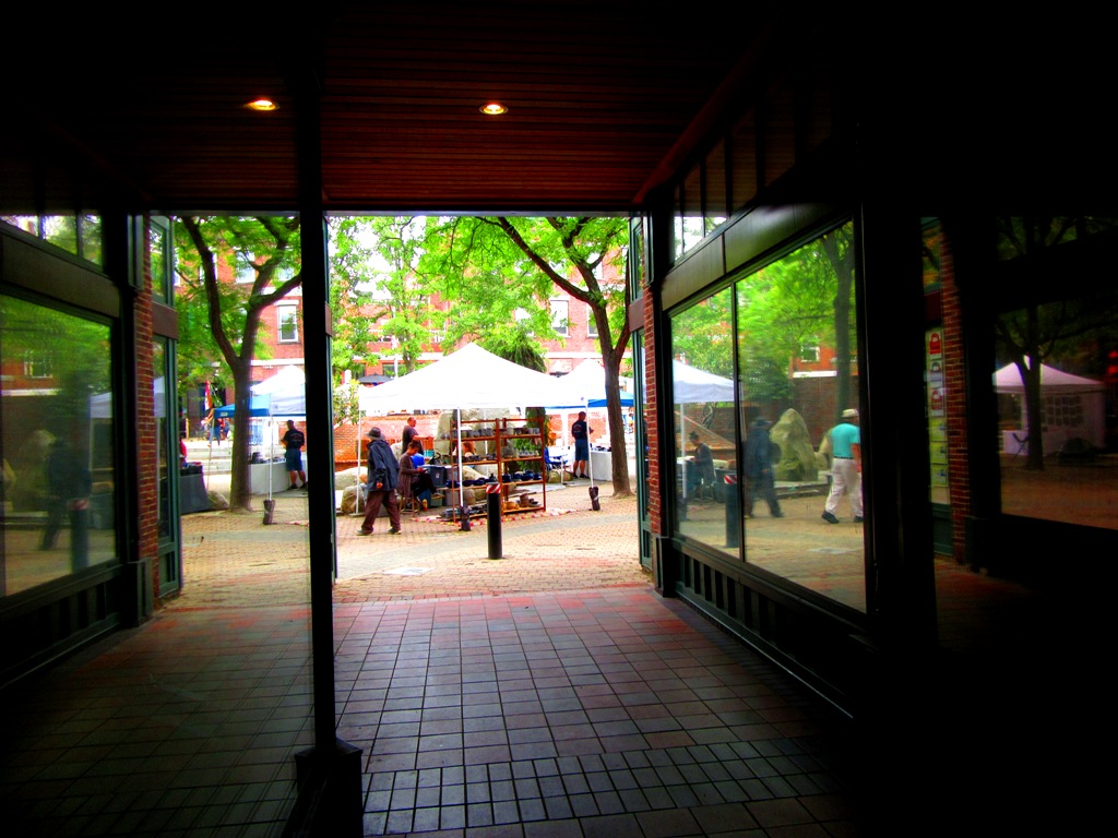 A short walk through this dark hallway from Main Street and you enter into the square.