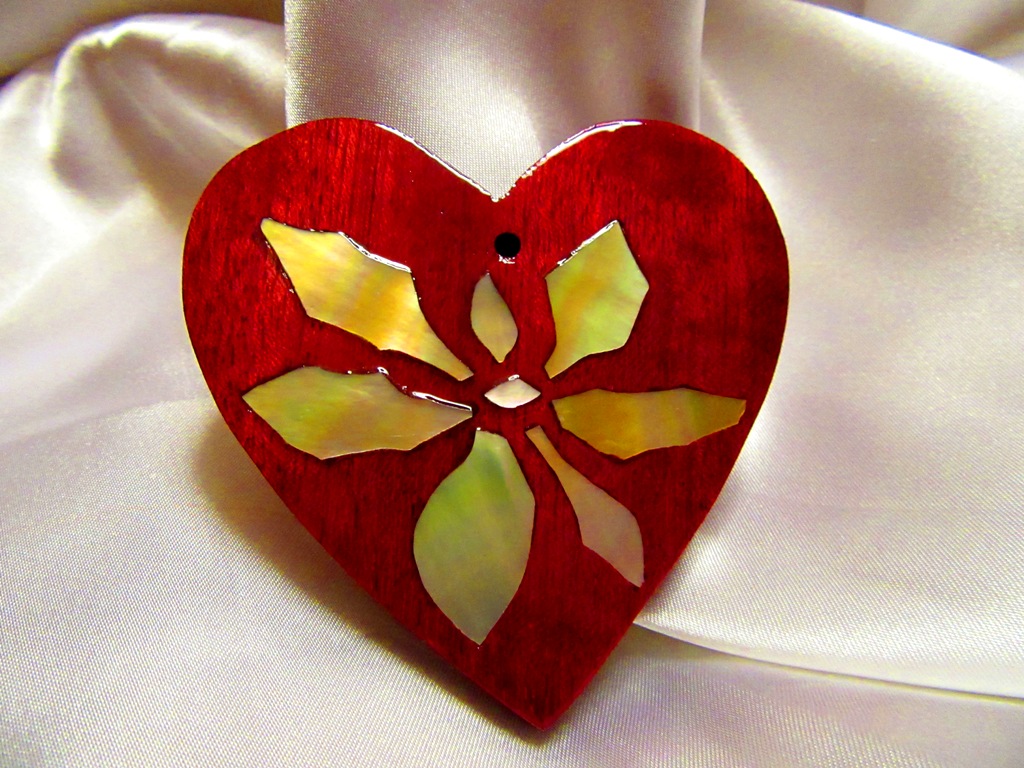Purpleheart heart with golden Mother-of-Pearl poinsettia inlay