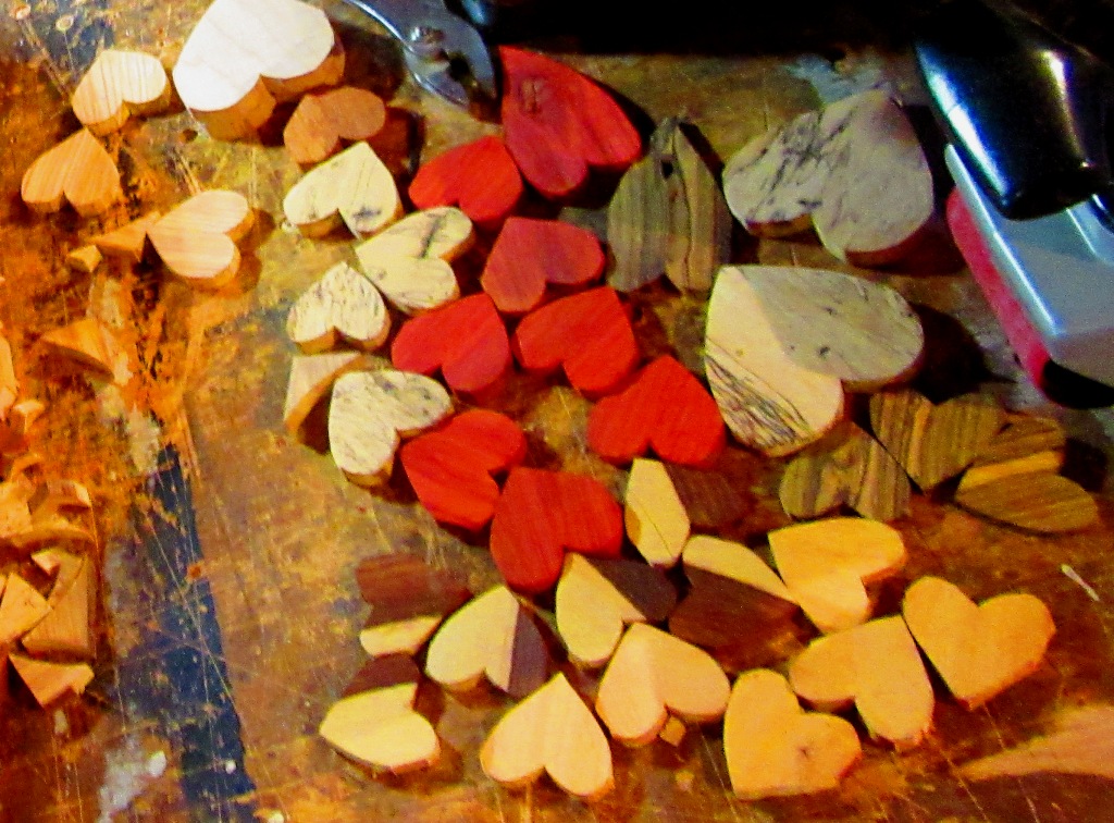   These are all the raw cut hearts that I showed earlier with hearts drawn on the separate long pieces.   