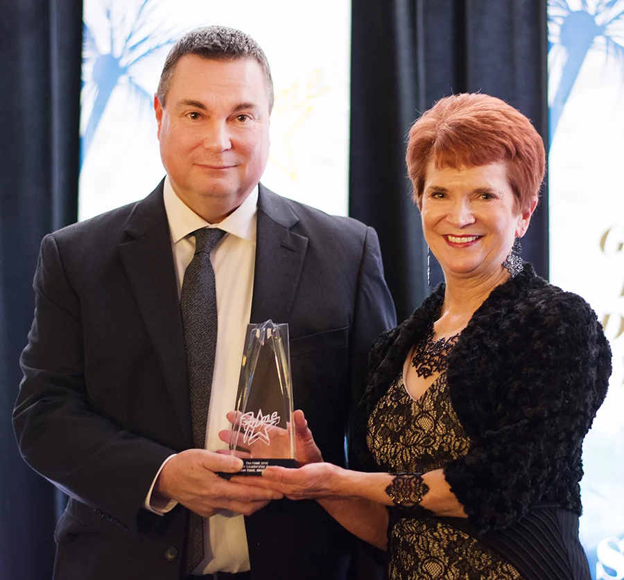 Ken Yant is pictured with Mary Begalle of Schwan's Food Company, one of the FAME sponsors
