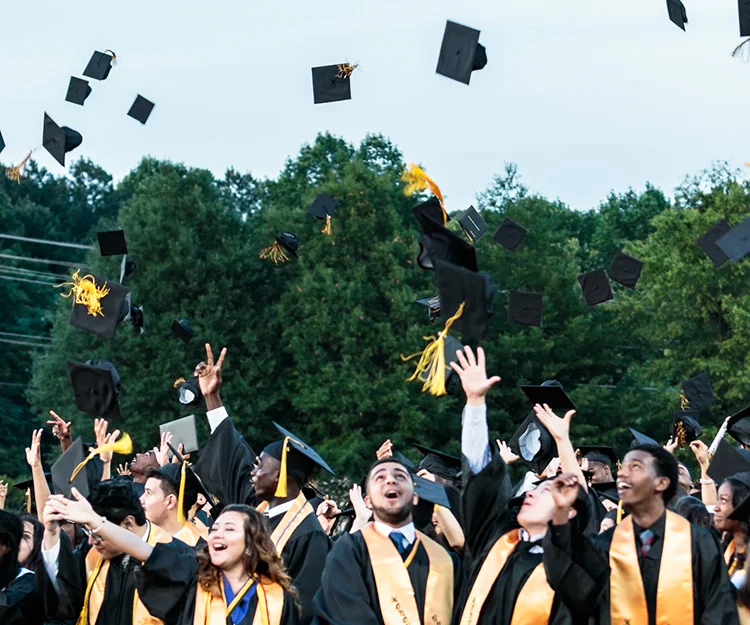 2016 Central Graduation_37_throwhats.jpg