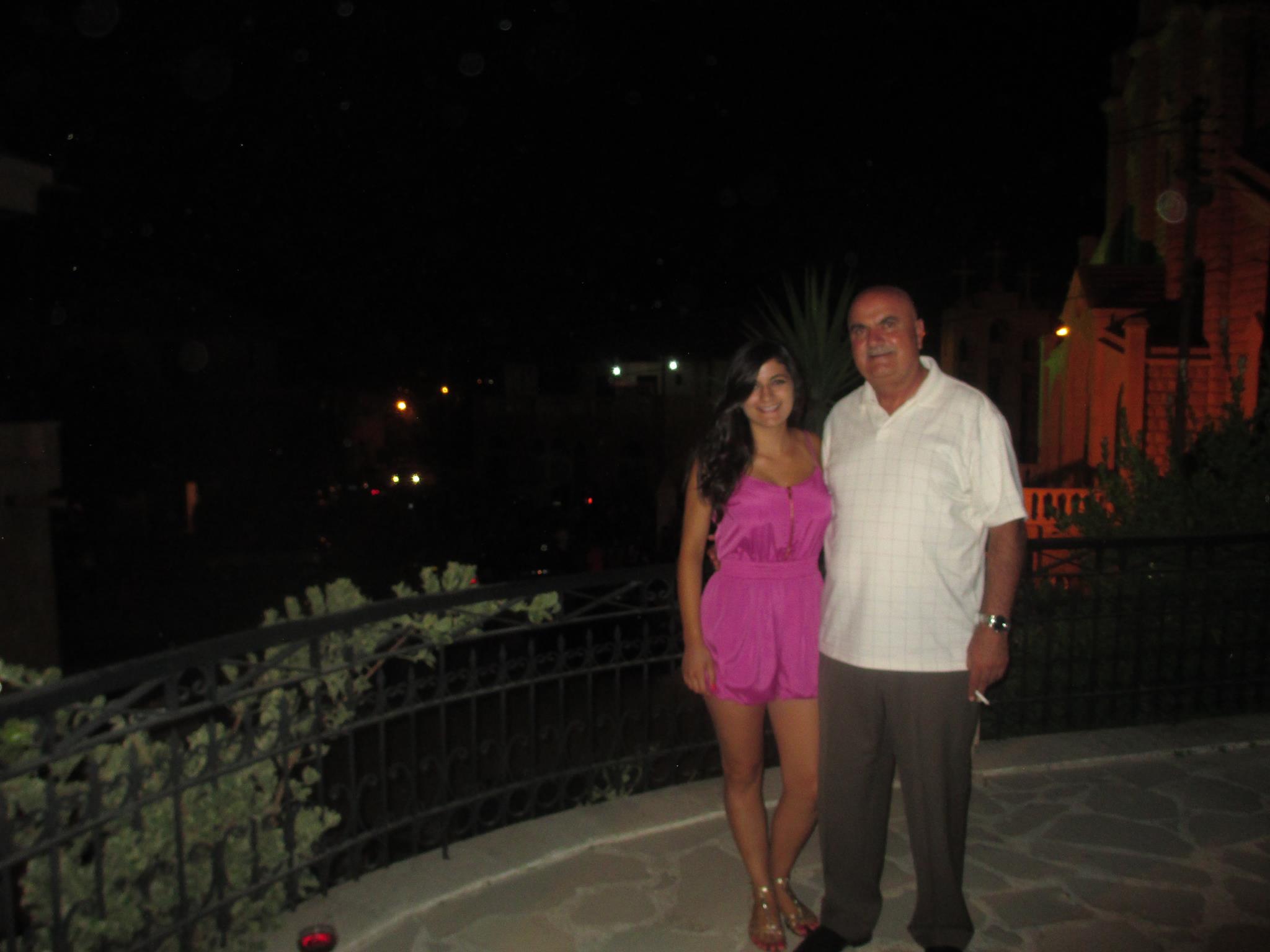 My dad and I standing on the porch of our home in August of 2013